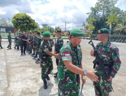 DANDIM 1710/MIMIKA HADIRI UPACARA PENGANTARAN PURNA TUGAS SATUAN ORGANIK YONIF PR 328/DGH DAN YONIF R 408/SBH