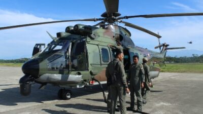 Heli Caracal TNI AU Bantu Pengiriman Logistik Pemilu Ke Distrik Jila Papua,Tengah