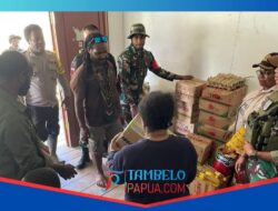 Satgas Yonif 611/Awang Long Lakukan Pengamanan Kegiatan Pemkab Mimika(LKMD) dan pembagian sembako kepada masyarakat Distrik Jila