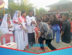 Jumat Agung: Umat Katolik lakukan Prosesi Cium Salib